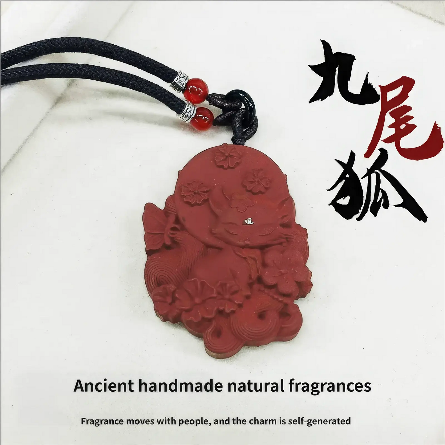 Nine - Tailed Fox double - sided incense pendant shown with text "Ancient handmade natural fragrances" and "Fragrance moves with people, and the charm is self generated", highlighting its traditional craftsmanship.