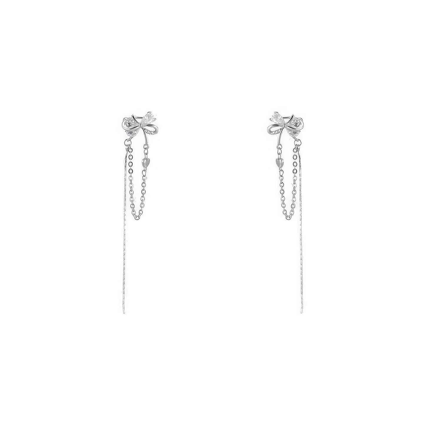 Pair of silver butterfly zircon ear cuffs with tassels, isolated on white