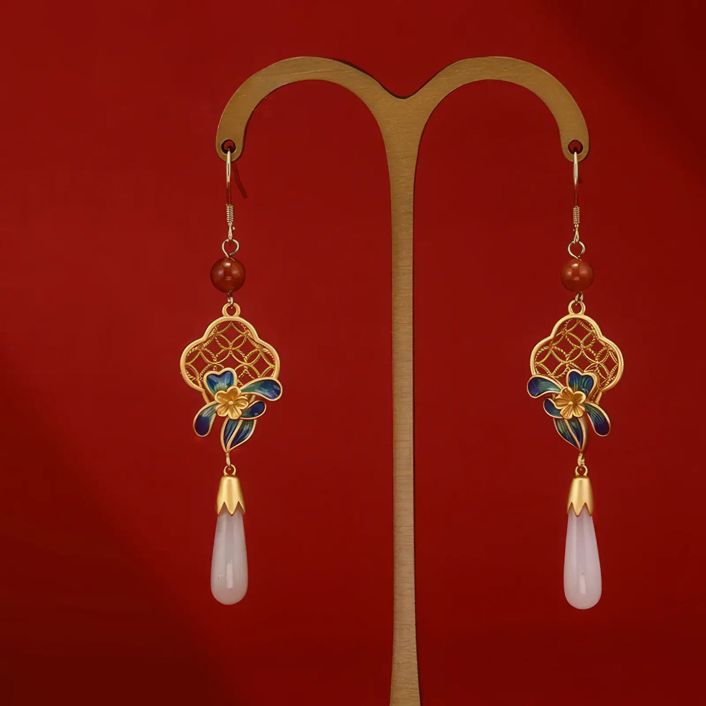 Cloisonne enamel nephrite drop earrings, gold - tone hooks, displayed on red stand