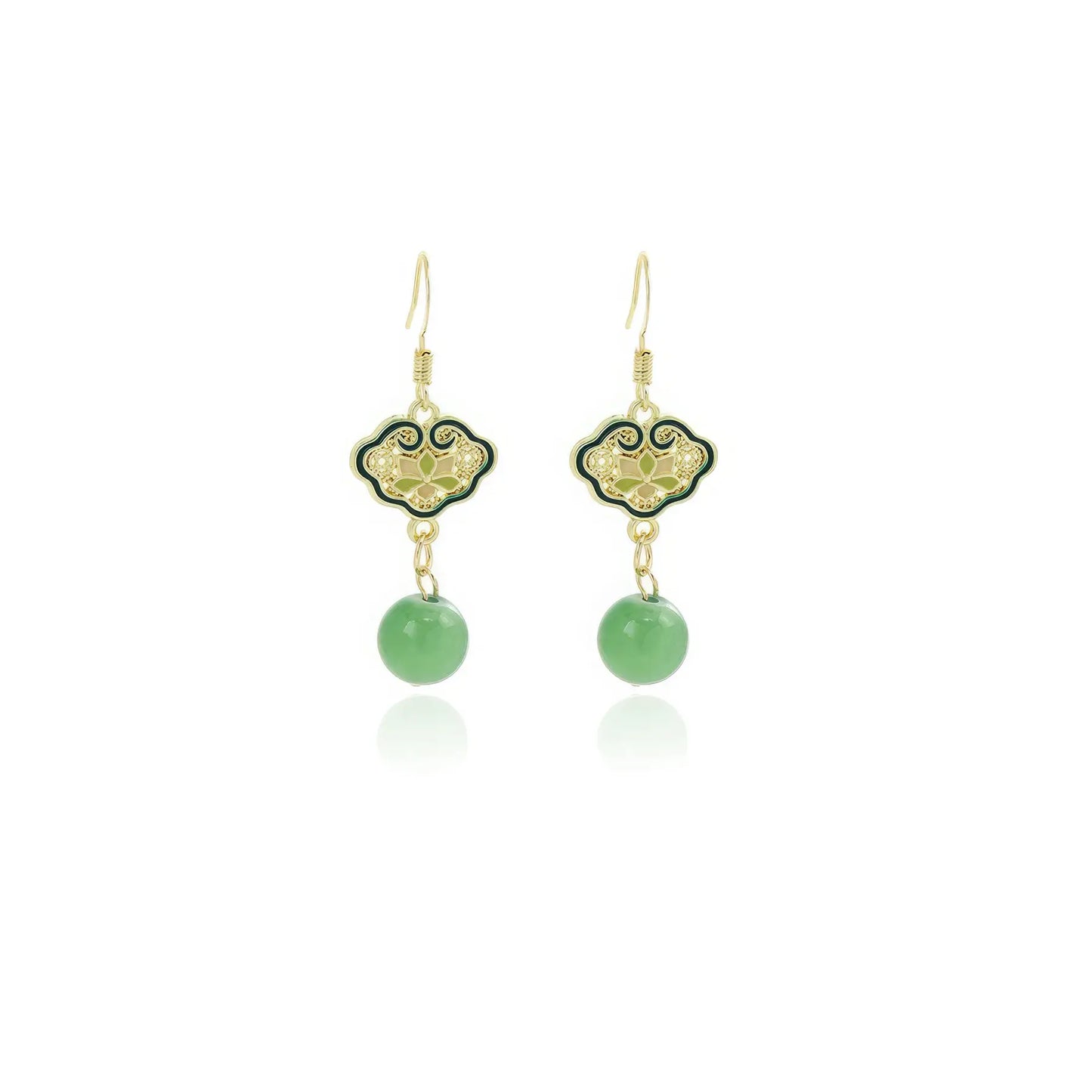Pair of green fan - shaped earrings with green drops on white background