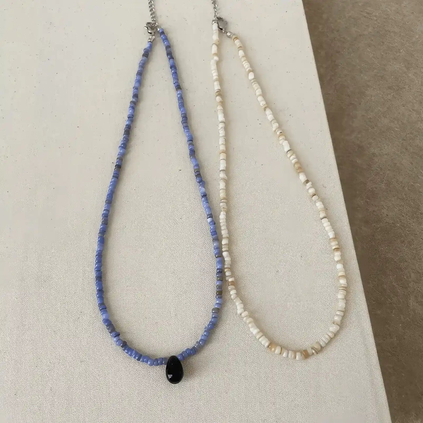 Set of new Chinese style handmade necklaces displayed side by side, emphasizing bead details