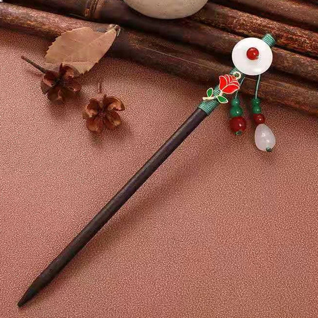 Yuhong hairpin with white circular ornament, colorful bead decorations, brown background with wooden elements