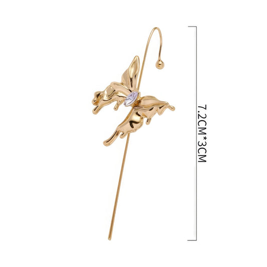 Gold butterfly ear cuff with size measurement, isolated on white background.