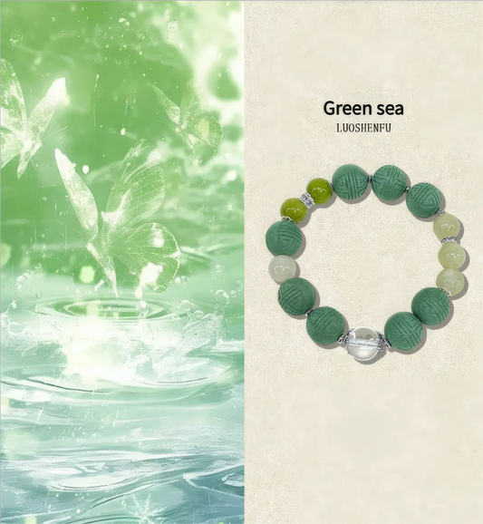  Clear - mind longevity character bead bracelet displayed against a green - toned background with the label "Green sea".