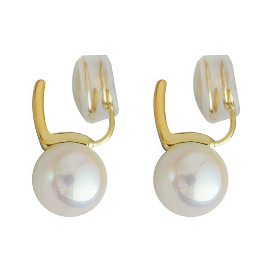 Pair of colorful pearl spiral clip earrings, gold - toned metal with lustrous pearls, isolated on white background, showcasing the unique clip design