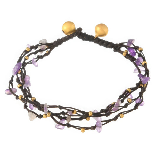 Forest - style retro crystal bracelet with purple crystals, isolated on a white background.