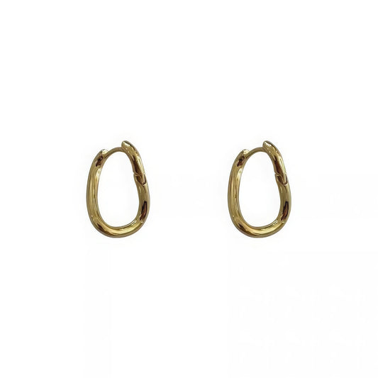 Pair of gold geometric irregular silver needle earrings, isolated on white background, showcasing the minimalist, irregular geometric design.