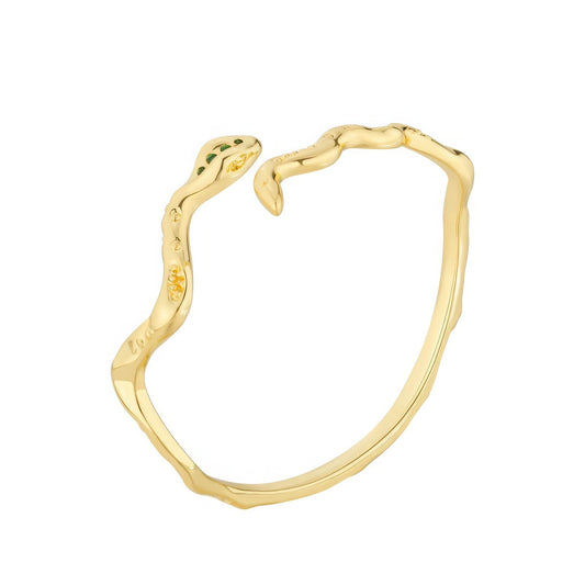  Gold - toned popular snake - shaped bracelet isolated on white background.