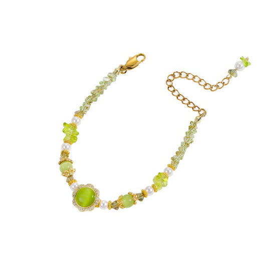  Handmade beaded bracelet with light green beads, isolated on white background
