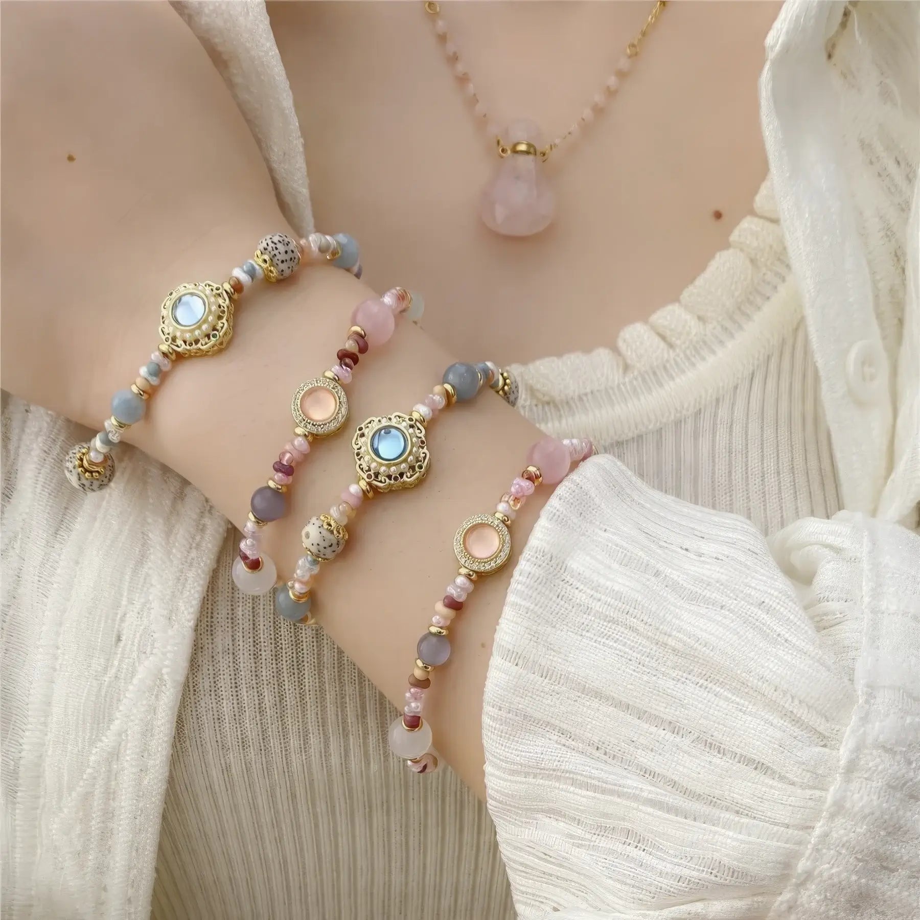  Multiple handmade beaded bracelets stacked on a wrist