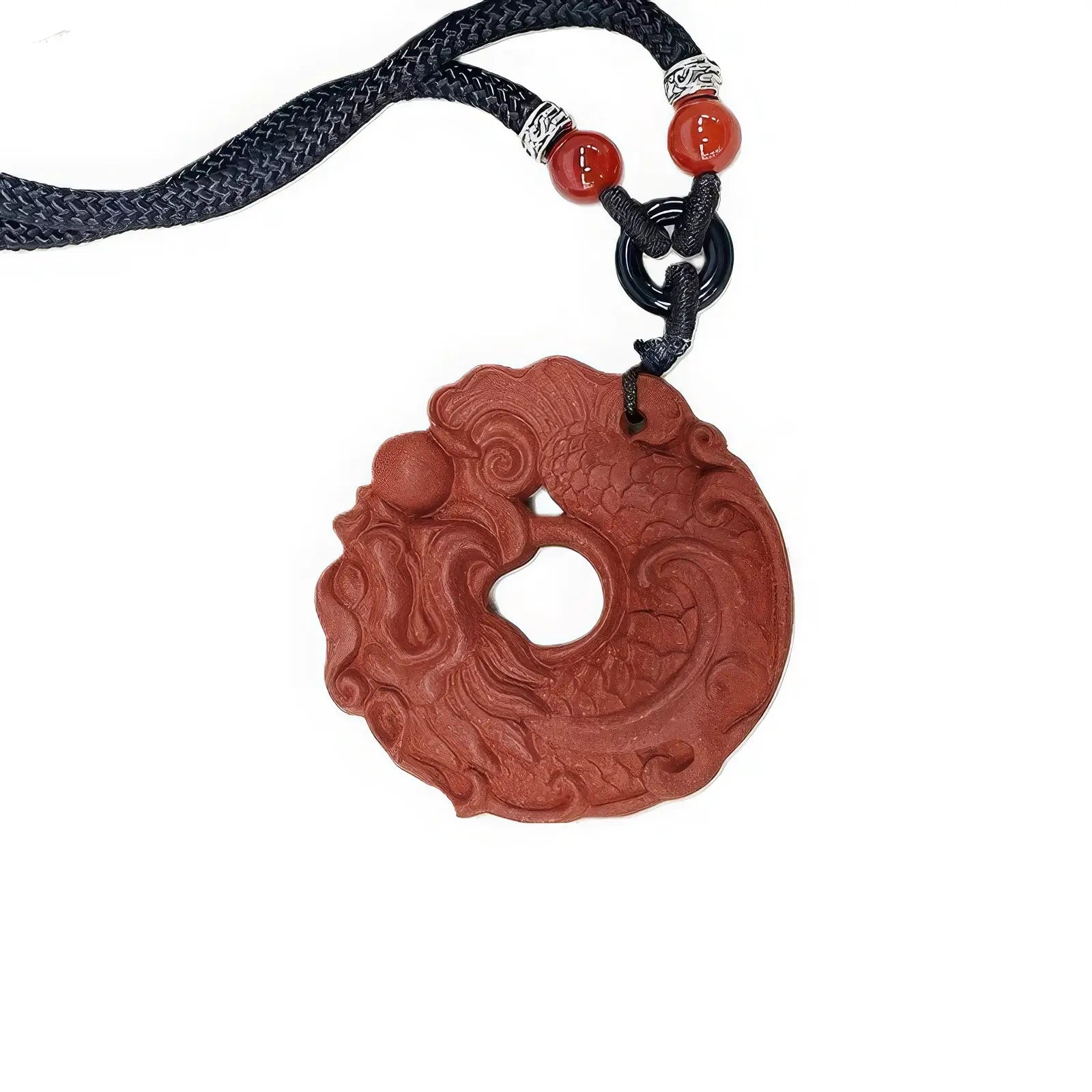 Close - up view of the Huarui Incense - Carp Transforming into Dragon incense pendant, showcasing the intricate carvings of the dragon and carp on the red - colored circular pendant.