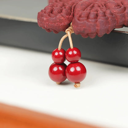  Partial close - up of the Lady Huarui - Double-Sided Butterfly Incense Pendant, showing the top part of the red butterfly - shaped pendant with three red beads hanging below.