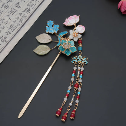 Side view of the hairpin, highlighting the gold-toned pin base, layered floral design, and the intricate beaded tassel structure.
