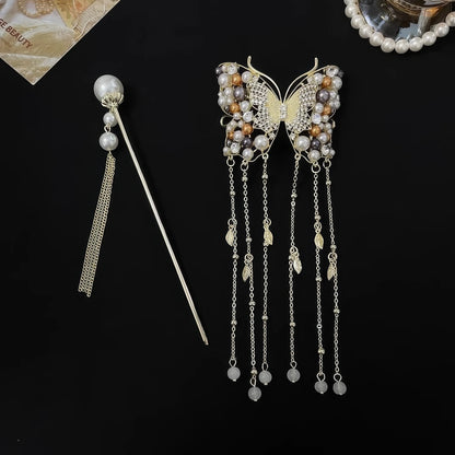 Separated display of butterfly tassel hairpin and individual pearl tassel hair stick, showing two pieces of the matching hair accessory set.