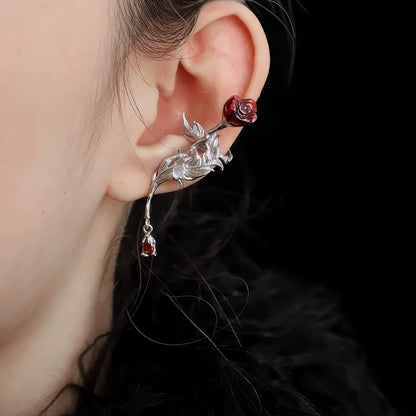 Rose feather ear cuff worn on ear, showcasing the detailed rose and feather elements.