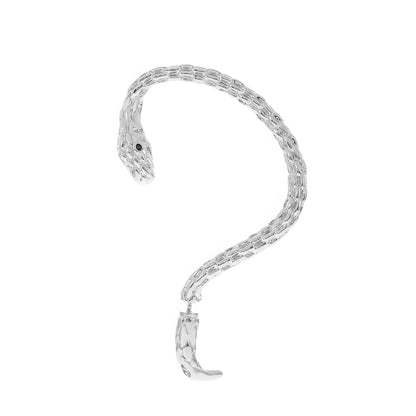 Silver snake - shaped ear cuff, designed to resemble a coiled snake, isolated on white background.