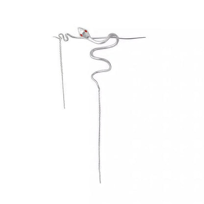 Cool-toned silver snake-shaped hairpin with sparkling stones and red eye details, paired with long tassels, clearly displayed against a plain white background.