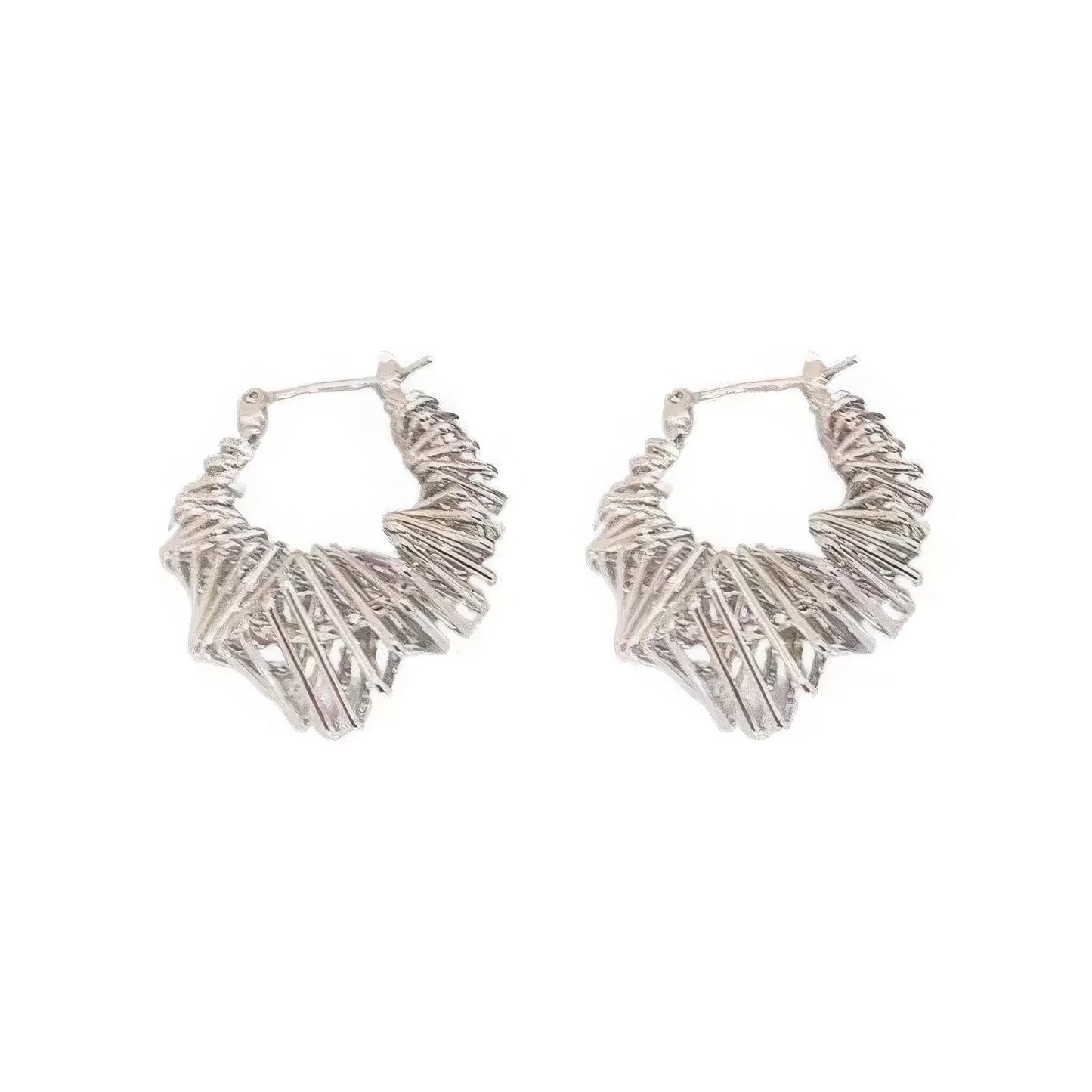  Pair of silver wrapped metal circle earrings, isolated on white background, highlighting the detailed, twisted metal structure