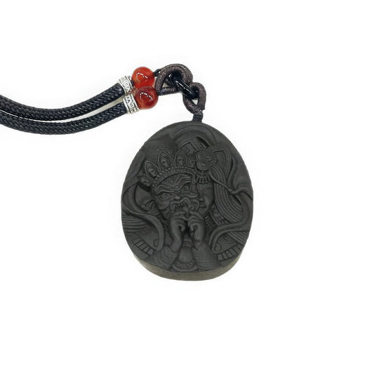 Close - up front view of the Zakiram incense pendant, highlighting the detailed carvings of Zakiram on the dark - colored pendant.