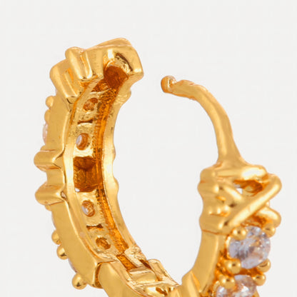 Close - up of gold zircon - inlaid cross hoop earring, highlighting the intricate cross design and zircon arrangement