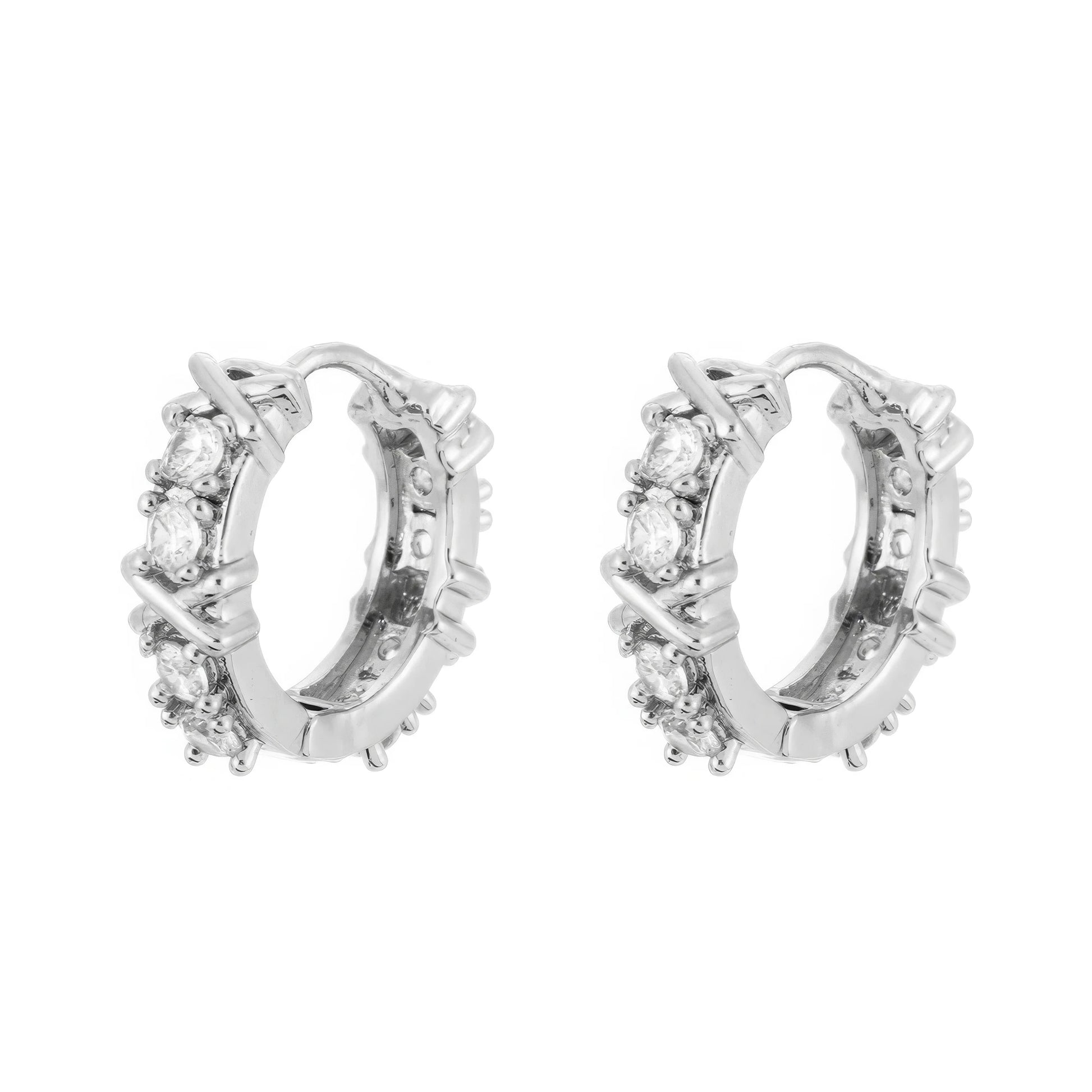Pair of silver zircon - inlaid cross hoop earrings, isolated on white background, highlighting the elegant cross - zircon design