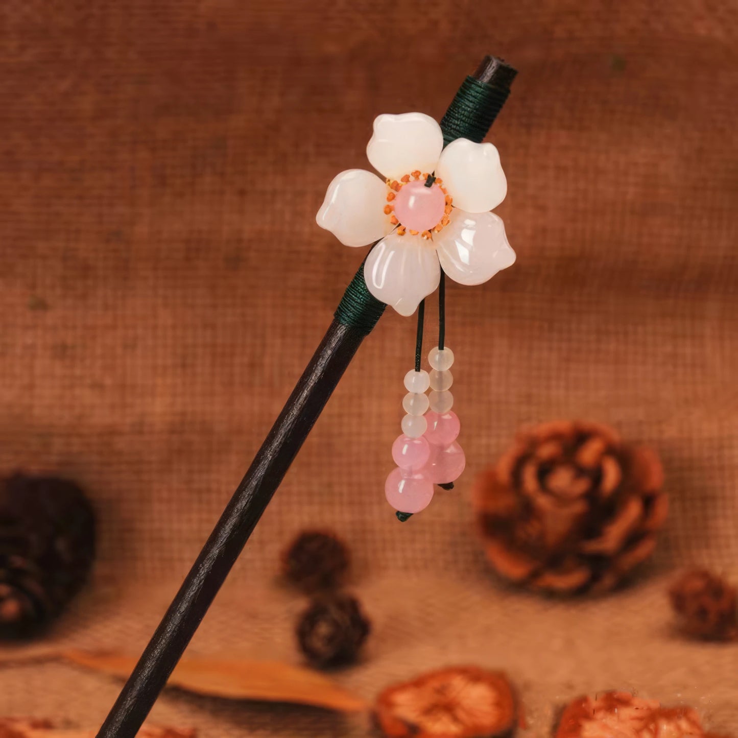 Large white flower with pink bead on Biyun hairpin