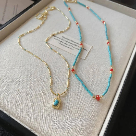 Double - layer bohemian stone bead necklace, turquoise and red beads, displayed in box