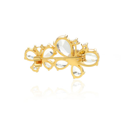 Gold butterfly diamond brooch, front view, highlighting crystal design