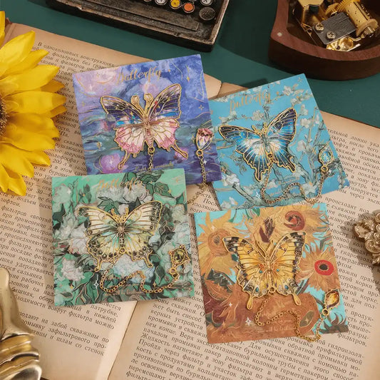 Butterfly in painting series oil painting bookmarks, multiple designs, displayed on open books with sunflowers in background