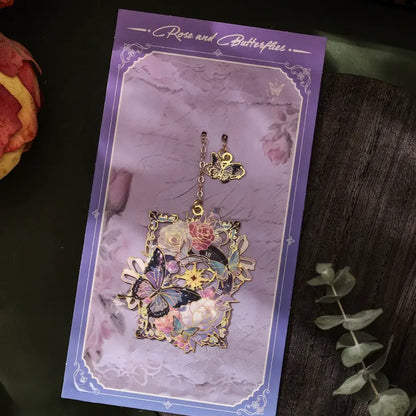 Butterfly - shaped metal lattice bookmark in blue packaging, presented on a vintage - looking table, realistic product display style, 3:4 ratio