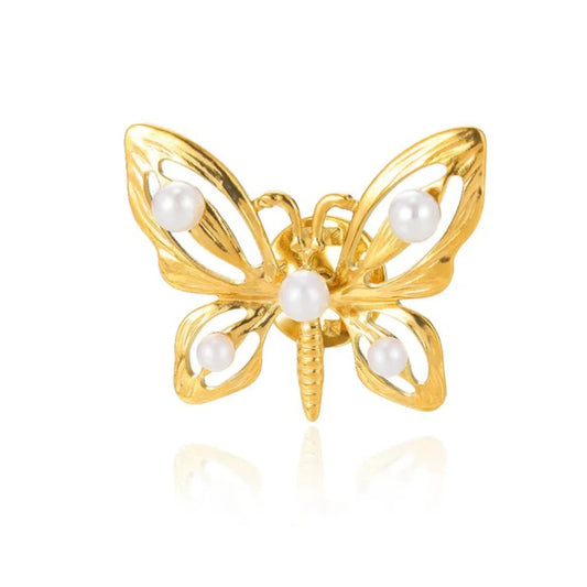 Gold butterfly brooch with pearls, front view, showcasing delicate design