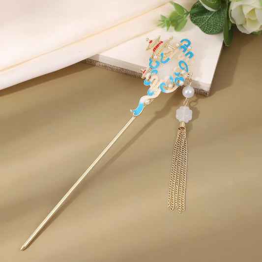 Caoruyin single hairpin with floral and tassel design, gold rod on brown background with white fabric and flowers