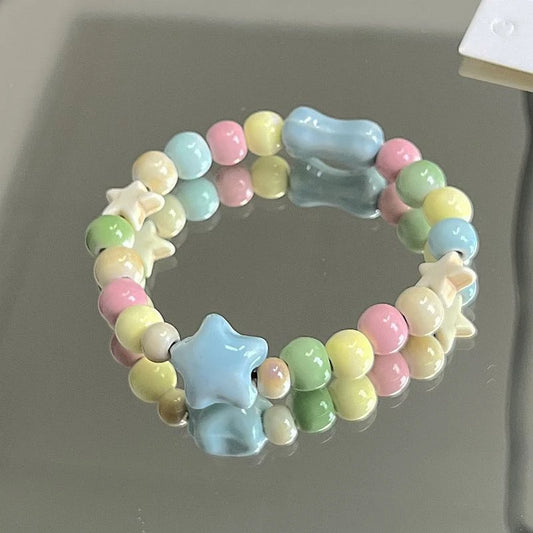rackle glaze ceramic bracelet with blue star and pastel beads