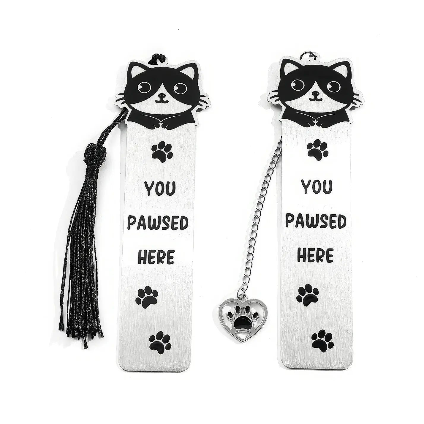 Pair of cute cat stainless steel bookmarks with chain and paw charm, isolated on white background
