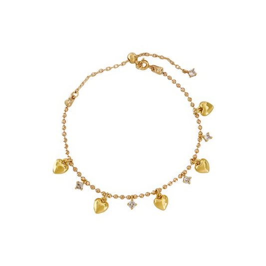 Dangling heart diamond bracelet, gold - tone, isolated on white background