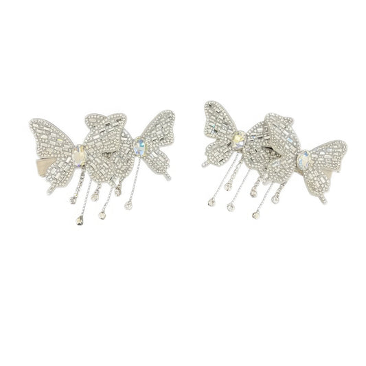 Silver double butterfly tassel hair clips isolated on white background