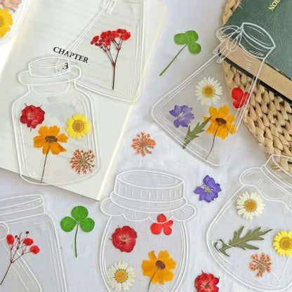 Another set of transparent bookmark with white jar outlines, isolated on black background