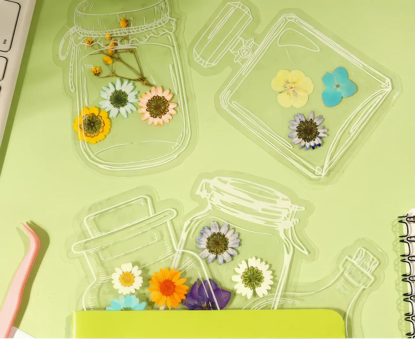 Transparent bookmark with white jar outlines, isolated on black background
