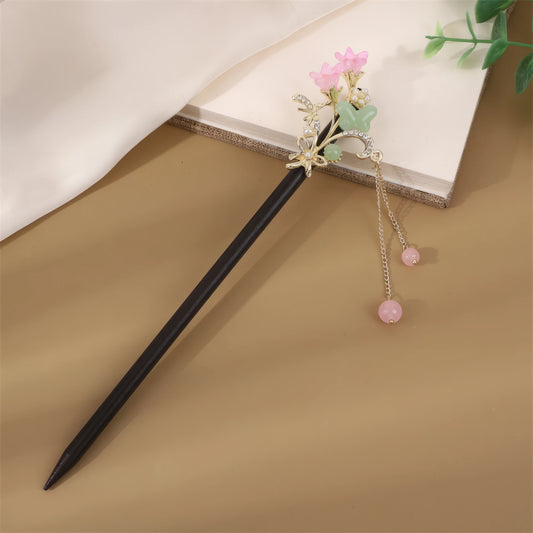 Feishaou hairpin featuring pink flower, gold stem and pink bead dangler