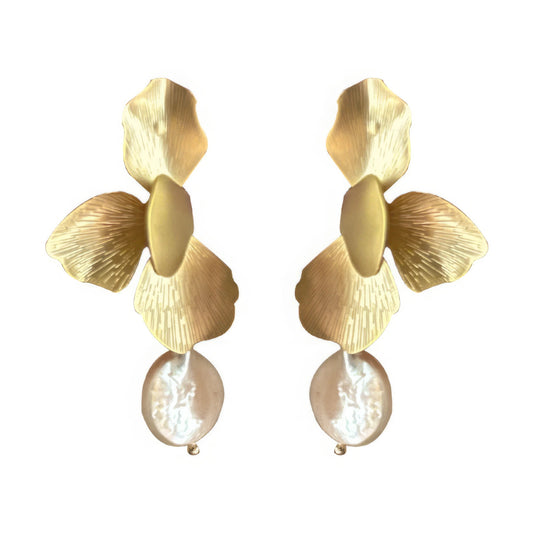 Gold flower baroque pearl earrings isolated on white background