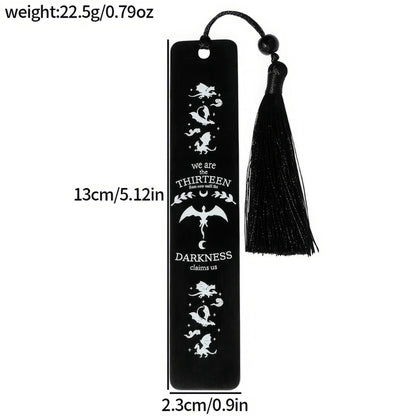 Set of black four - winged dragon metal bookmarks with tassels, showing size/weight specs
