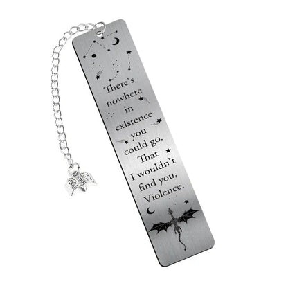 Silver four - winged dragon metal bookmark with charm, isolated on white