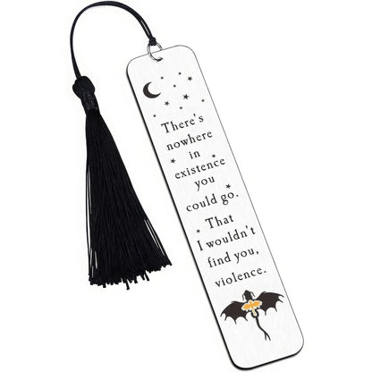 White four - winged dragon metal bookmark with black tassel, isolated on white