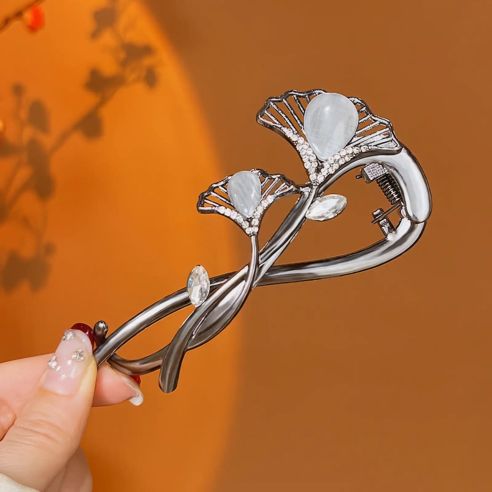 Ginkgo - leaf - shaped twist hair clip with crystal and gemstone details