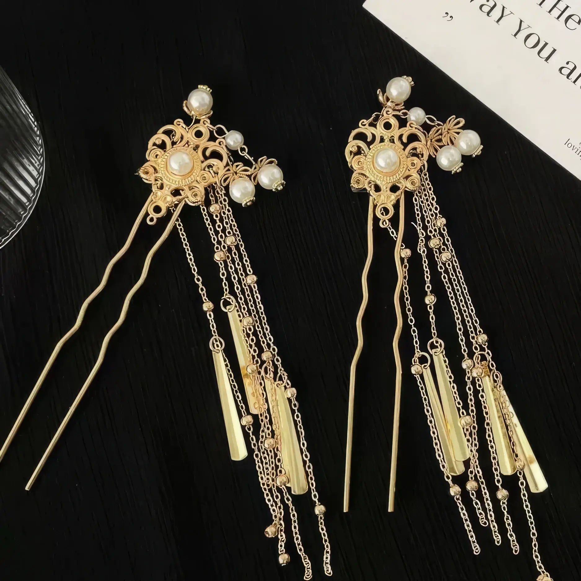 Pair of gold and silver pearl tassel hairpins, flatlay display