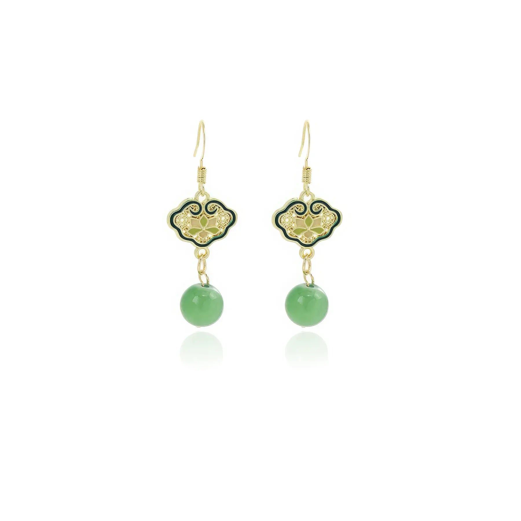 Pair of green fan - shaped earrings with green drops on white background