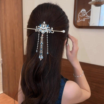 The hairpin worn in a half-up hairstyle, elegant decorative effect.