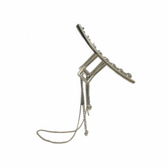 Silver heart - shaped tassel chain hair claw, isolated on white background