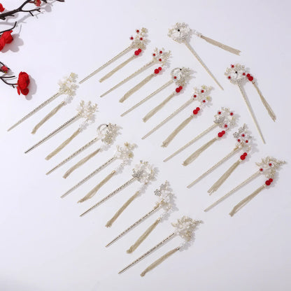 Set of Houtinghua hairpins with various floral and bead designs, gold tassels