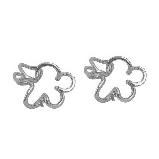Silver irregular flower ear clips, isolated on white background, highlighting the abstract floral shape